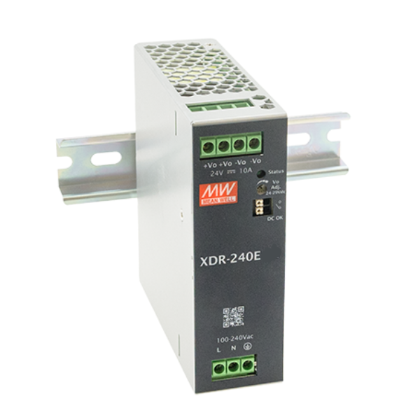 MEAN WELL XDR-240E DIN Rail Power Supply is a Small rectangular metal box mounted vertically on a metal din rail strip. This power supply features voltage inputs and outputs on the front face, with additional inputs at the bottom of the front panel.